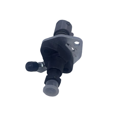 A small black and gray plastic mechanical component with a small side tab, photographed on a scratched white surface.