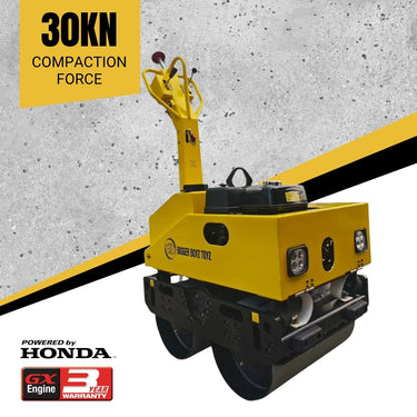 Yellow compaction machine with 30KN compaction force on a concrete surface, featuring Honda GX25 engine.