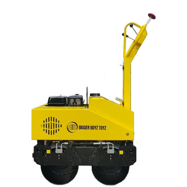 Yellow piece of equipment with 'Bigger Boyz Toyz' branding on a white background