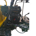 Close-up of a lawn mower engine with visible brand logo on a white background