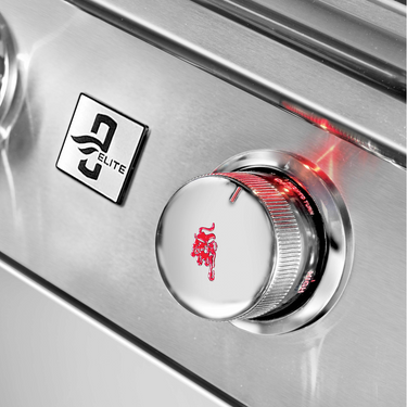Close-up of a stainless steel control panel featuring a round silver knob with a red logo in the center and a black-and-white ELITE brand badge.