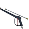 A high-pressure water spray gun with a black handle and trigger, a long metal wand, and a brass nozzle tip, displayed on a white fabric backdrop.