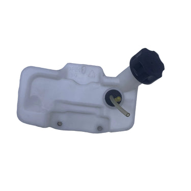A white plastic reservoir tank with a black cap and a small brass tube, photographed on a light gray surface.