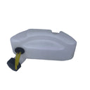 A translucent white plastic reservoir tank with a black cap and yellow hose, resting on a scratched white surface.