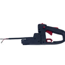A black and red handheld tool with a long thin black rod attached, photographed on a white surface.