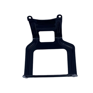A black plastic mounting bracket or frame part, photographed flat on a light gray, scratched surface.