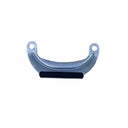A curved silver metal cabinet pull handle with a black grip in the center, mounted on a scratched gray surface.