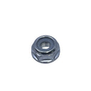 A small silver metal hex nut with a square center hole, resting on a scratched, light gray metal surface.