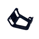 A black plastic mounting bracket or frame component, photographed on a white studio backdrop with visible surface scuffs and scratches.