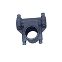 A small gray metal mechanical fitting or clamp with a circular opening, photographed on a scratched light gray surface.