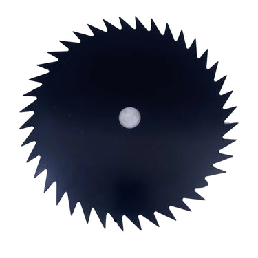 A circular black circular saw blade with sharp teeth and a central mounting hole, photographed on a light gray textured surface.