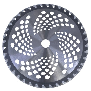 A circular metal circular saw blade with a perforated design and sharp teeth around the edge, photographed from above on a light gray surface.
