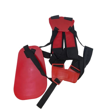 Red and black protective gear set including a padded shield and chest protector with straps, displayed on a white studio backdrop.