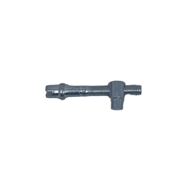 A small silver metal bolt or pin with a hex head, lying on a scratched, light gray metallic surface.