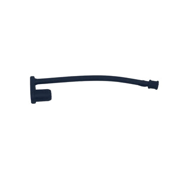 A small black plastic replacement part, possibly a handle pull or bracket, lying on a scratched, light gray metal surface.