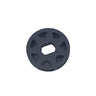 A small circular gray plastic drain stopper or filter component resting on a scratched, light gray surface.