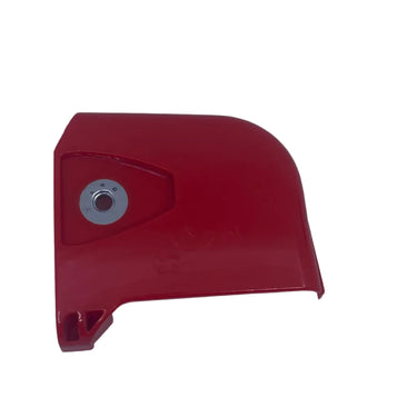 A small red plastic cover or guard with a single visible silver screw, placed on a scratched white surface.