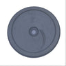 A circular gray plastic component with a central hole and a small curved slot, shown on a scratched light gray surface.